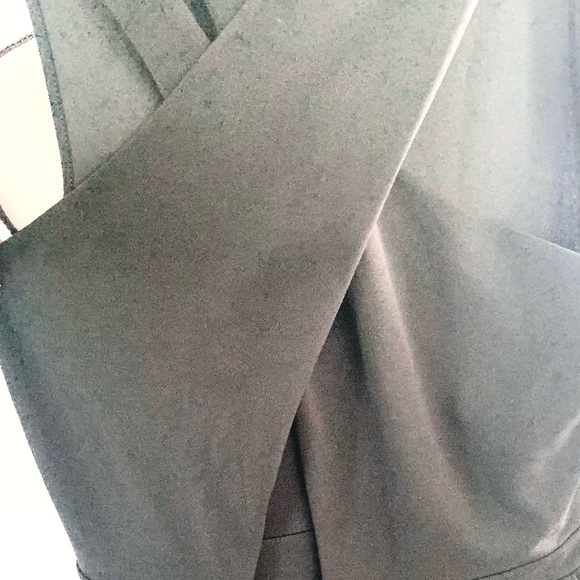 Express Black stretch jumpsuit. Low v neck front & opening below breast line. - Picture 6 of 9